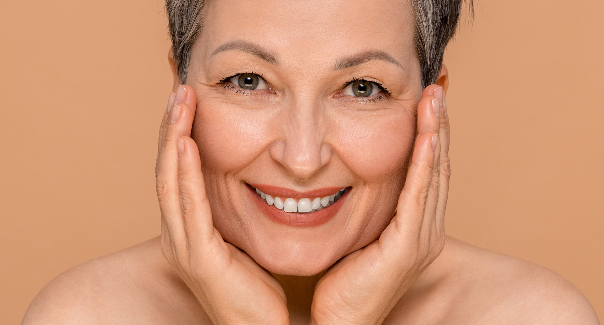 Smiling woman to illustrate overall skin quality in Morpeth